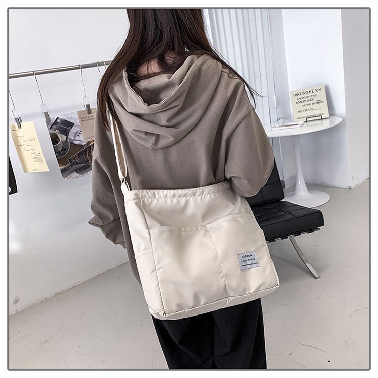 Túi Đeo Chéo Bằng Nylon Chống Nước Sức Chứa Lớn Có Khóa Kéo Thời Trang Cho Học Sinh