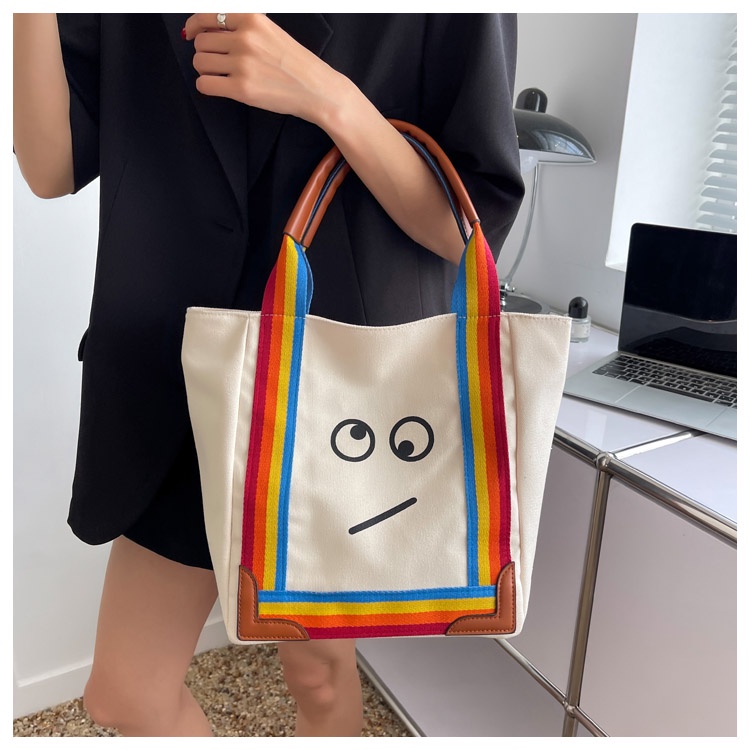 Túi xách mặt cười quai dài