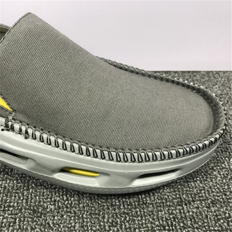 GIÀY  LƯỜI VẢI  CROSS TIDELINE SLIP ON CHO NAM MÀU XÁM