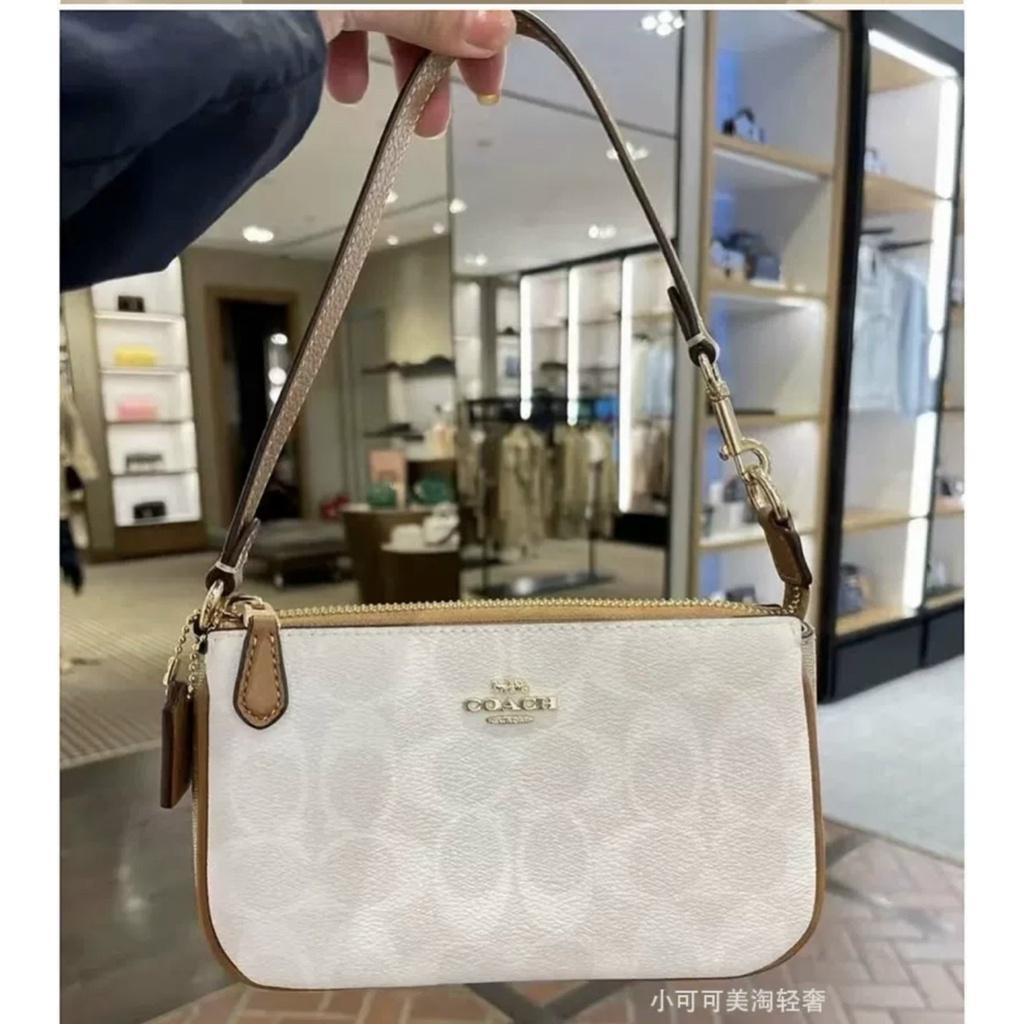 Túi kẹp nách nữ Coach thuyền full box 19cm x5cmx12cm màu trắng