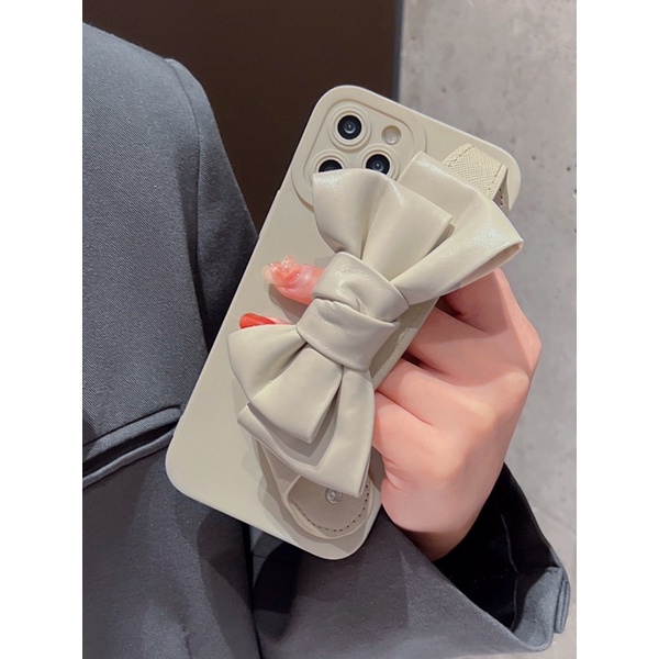 Ốp lưng i.phone trang trí nơ đeo tay