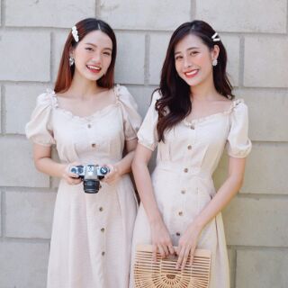Đầm caro nút gỗ tay phồng