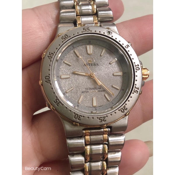 Đồng hồ nam hiệu attesa titanium quartz