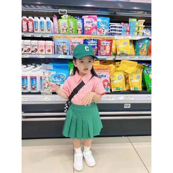 Set áo polo hồng cv xanh xếp ly bé gái