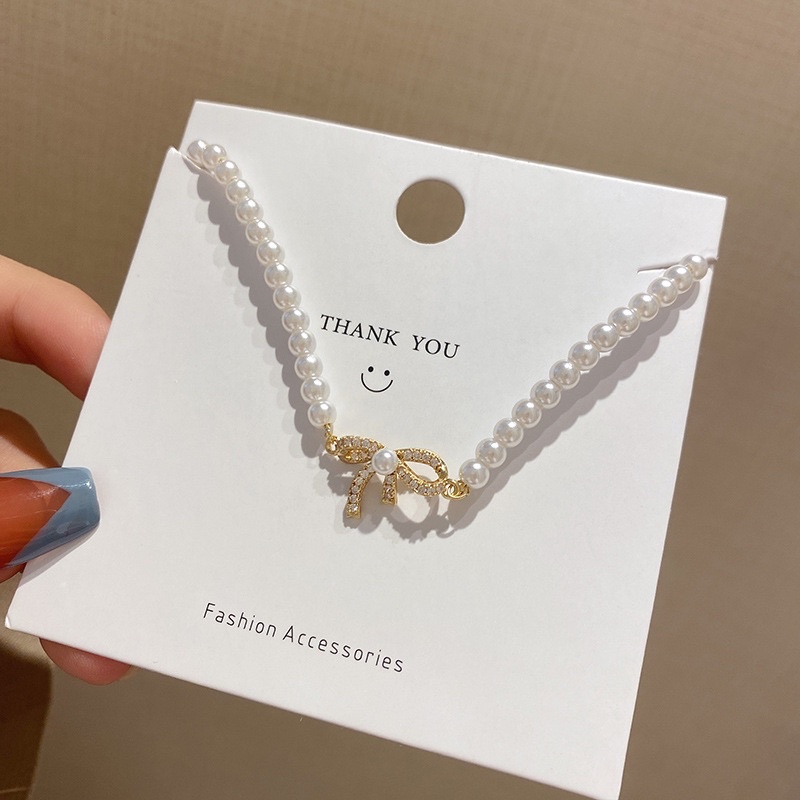 Vòng tay ngọc trai nhân tạo hình nơ cho nữ, lắc tay ngọc trai hình nơ