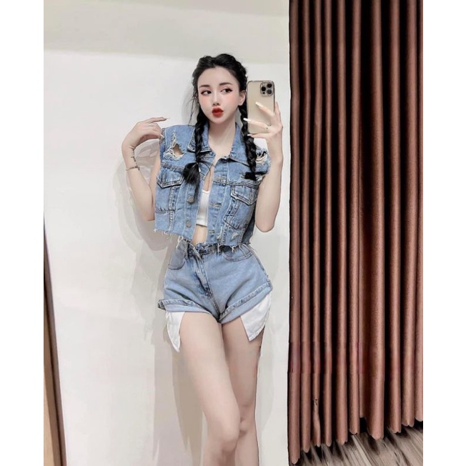 Áo gile bò rách tả tơi