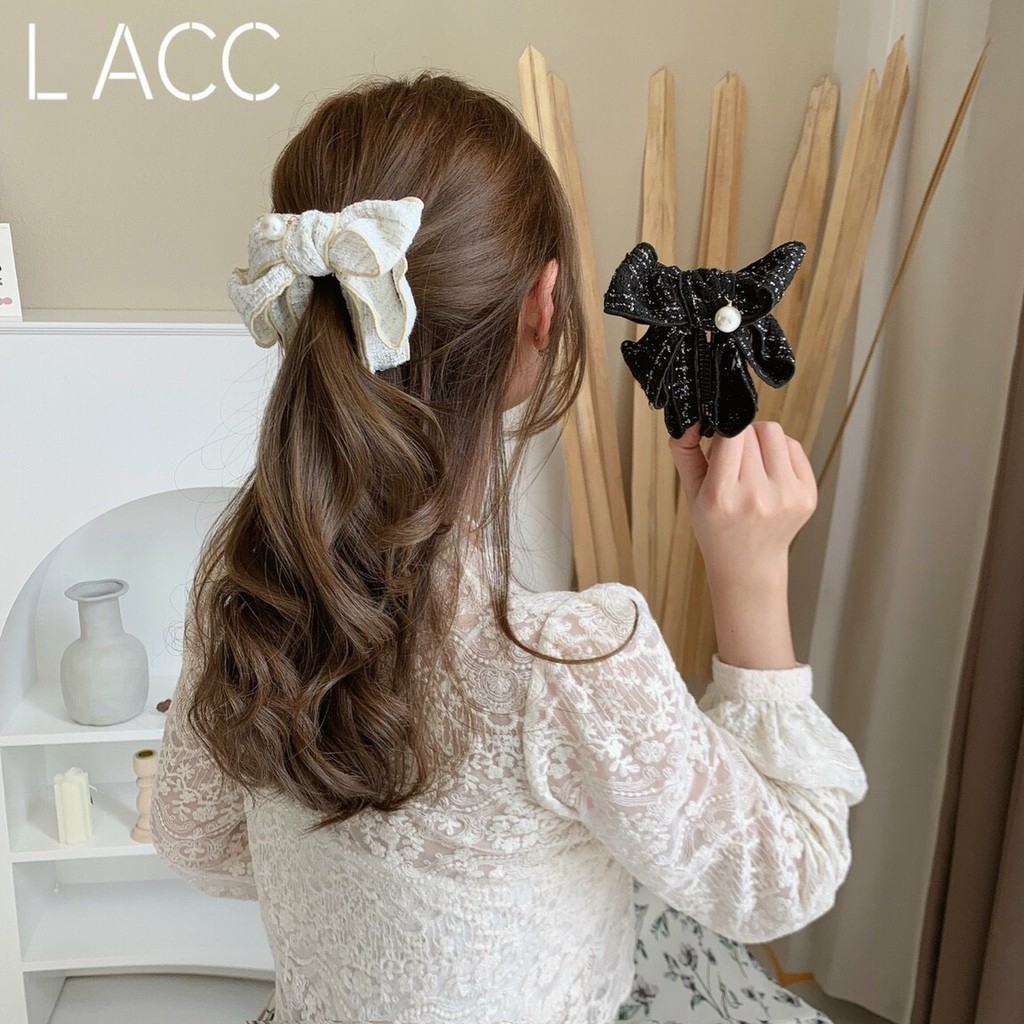 Kẹp nơ dọc tạo độ phồng tóc phong cách Hàn hottrend