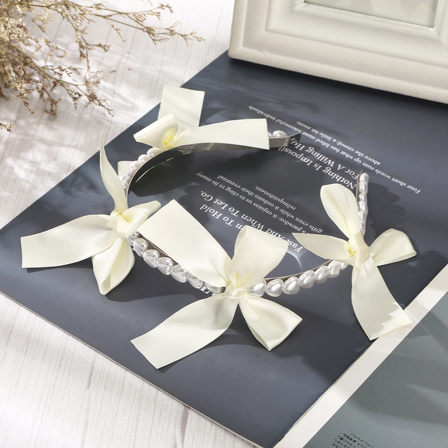 Băng Đô Cài Tóc Đính Nơ Ngọc Trai Dễ Thương Dành Cho Nữ