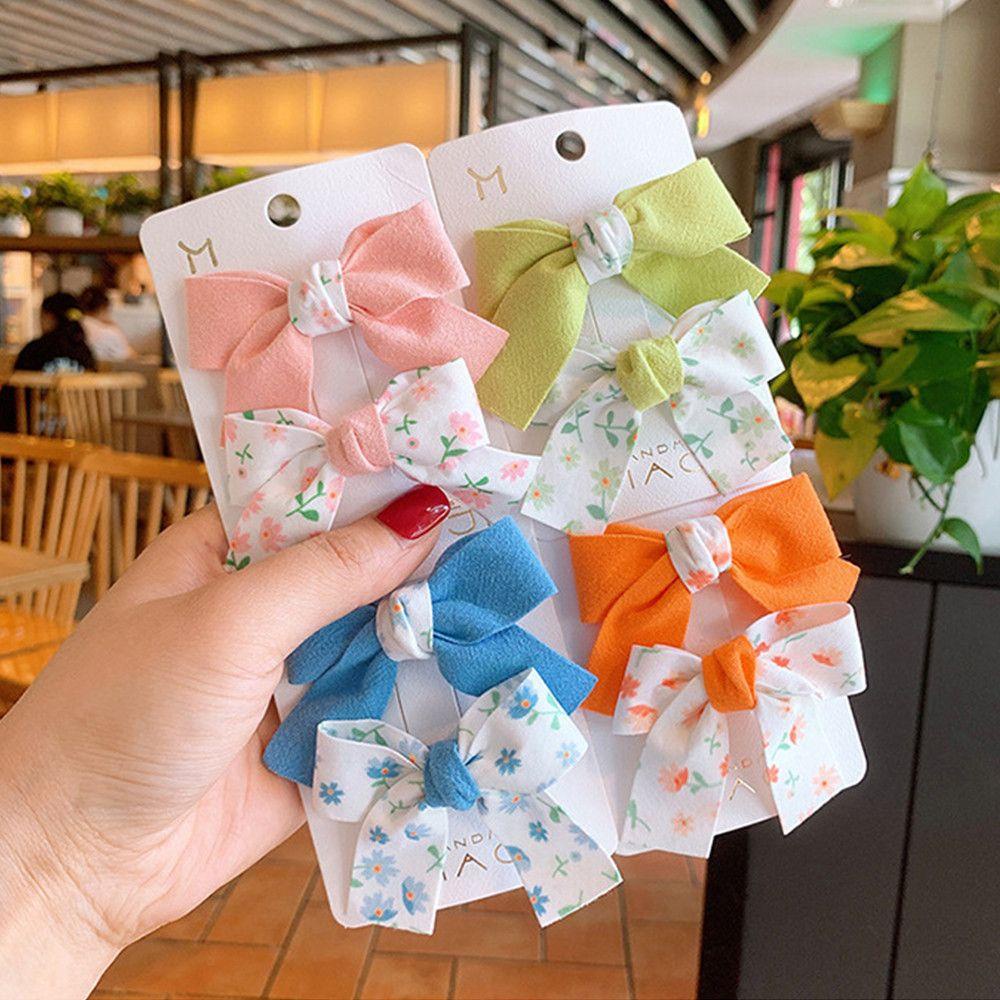 Bộ 2 Kẹp Tóc Nơ Họa Tiết Hoa Xinh Xắn Cho Bé Gái