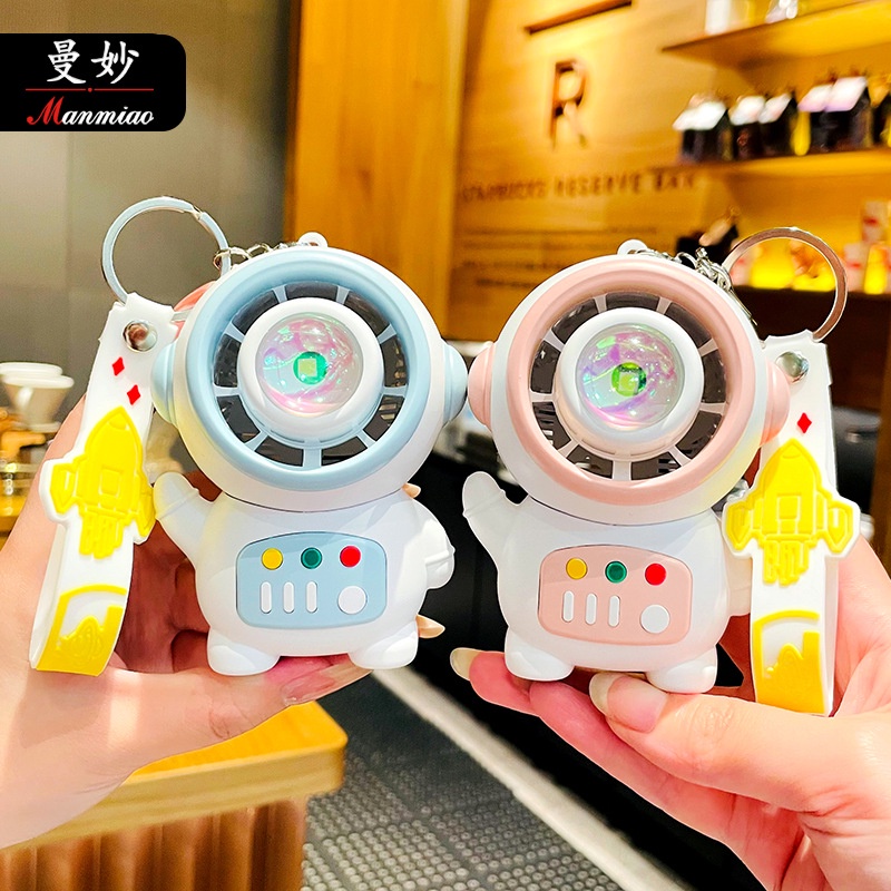 Quạt Mini Cầm Tay Hình Phi Hành Gia Có Đèn Ban Đêm Và Cổng Sạc USB