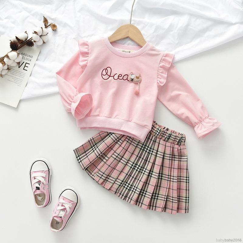 Bộ đồ gồm áo ngắn tay dài + chân váy phối họa tiết ca rô xinh xắn cho bé gái