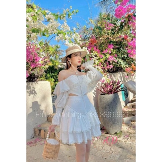 Set áo trắng croptop rớt vai tay dài loe + chân váy trắng tầng