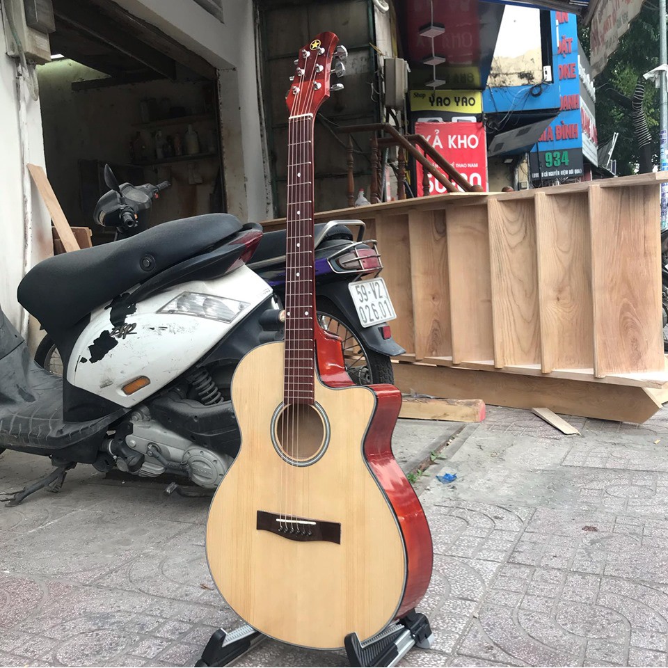 Đàn Guitar Acoustic giá rẻ cho người chơi ,có ty ,gỗ thịt nguyên tấm Tặng giáo trình tự học