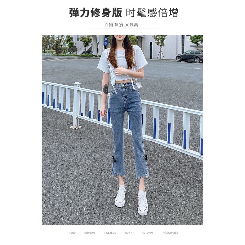 Bow stretch micro-horn forked jeans women's high waist, abdomen, body-building, nine-cent pants, thin style in summer.