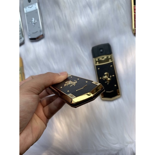 Điện thoại A8 đen vàng