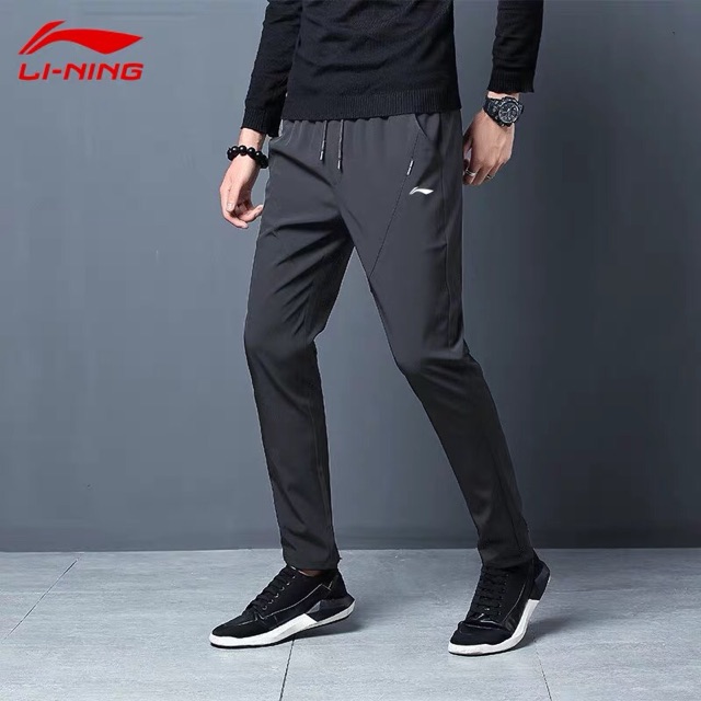 Quần gió lining nam