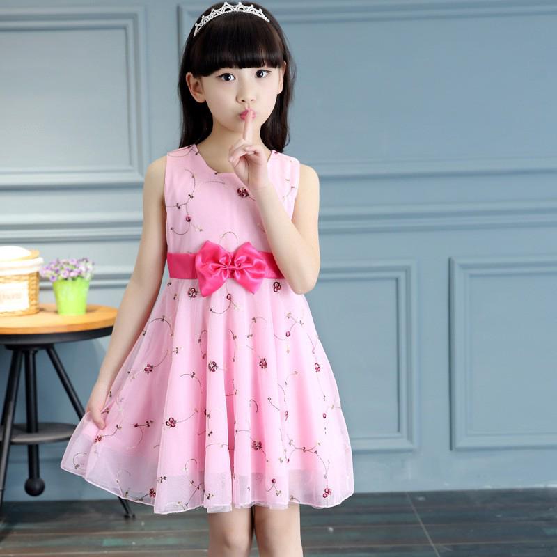 Đầm hoa cộc tay phối nơ cho bé gái