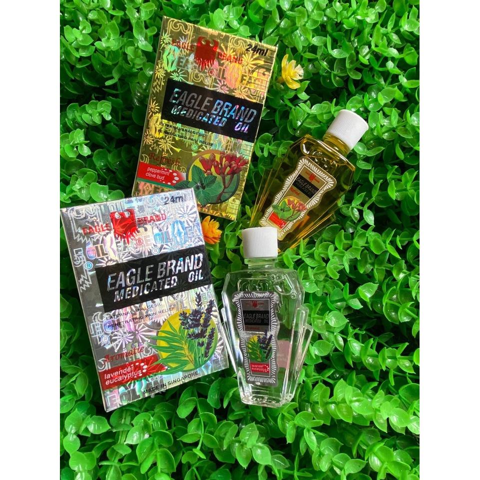Dầu Gió Con Ó 2 Nắp Singapore 24ml Màu Trắng - Vàng