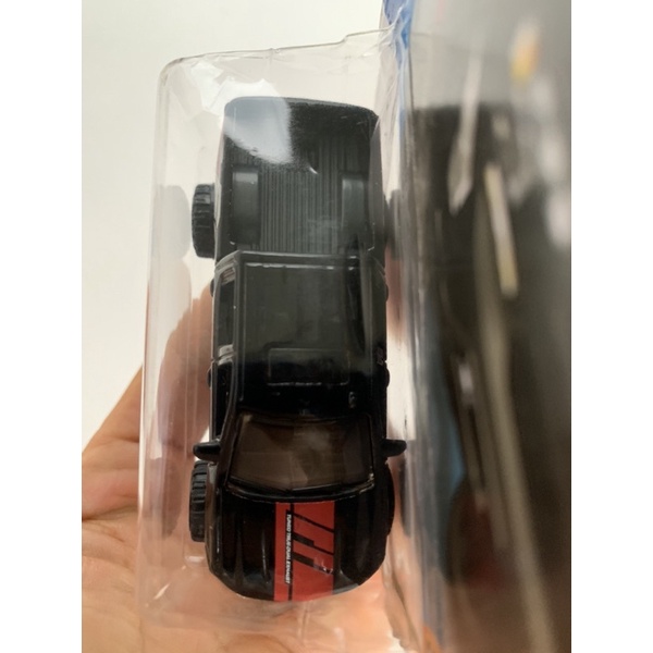 Xe Hot Wheels '19 Chevy Silverado Trail Boss LT tem Borla