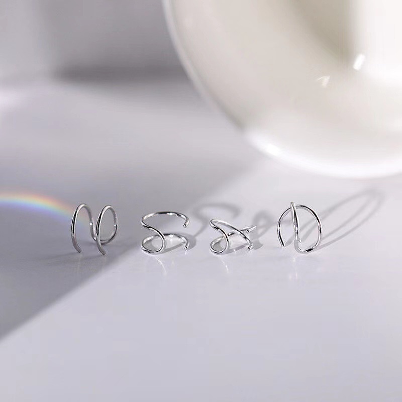 Khuyên tai WE FLOWER dạng kẹp vành không xỏ lỗ thép không gỉ thiết kế đường chéo/ ngang thời trang unisex