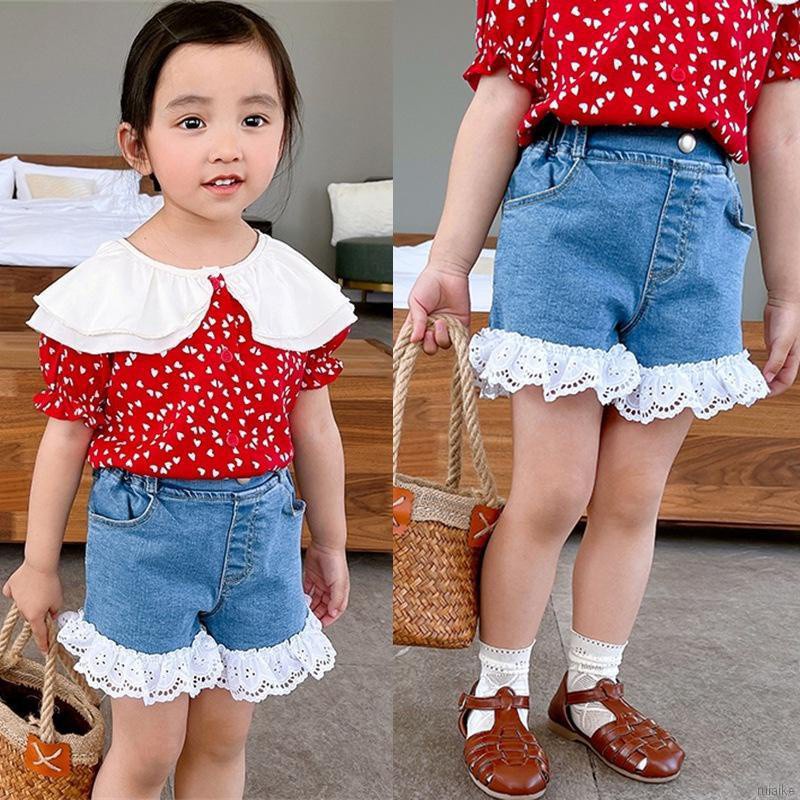 Quần Short Denim Lưng Thun Phối Ren Có Nút Cho Bé Gái