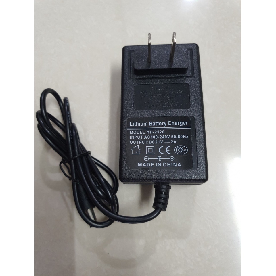 Sạc 5s 21v 2A hàng new,chuyên sạc pin Lion , có đèn báo sạc