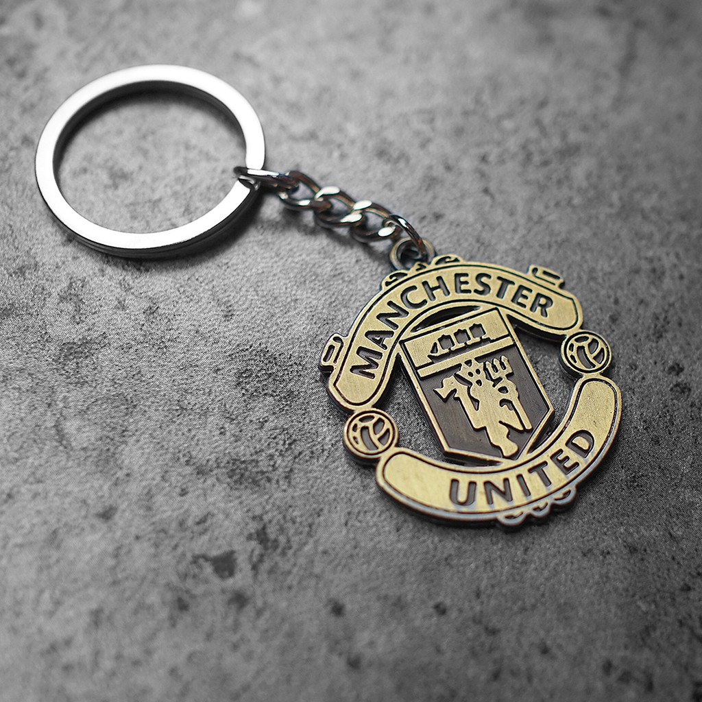 Móc khoá logo đồng MU