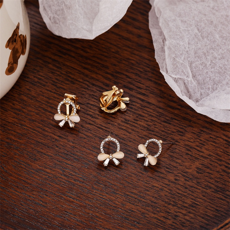Khuyên tai kẹp không bấm lỗ chốt cố định K011 bằng hợp kim mạ vàng hình tròn nơ đính đá dáng ngắn Leous Accessories