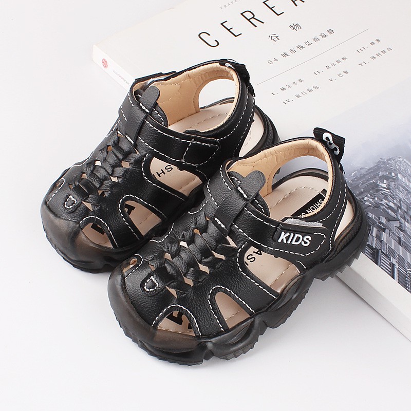Sandal tập đi cho bé, Dép rọ bé trai bé gái quai dán KIDS chất da PU thoáng khí có chống vấp cho bé từ 0-2 tuổi M8810