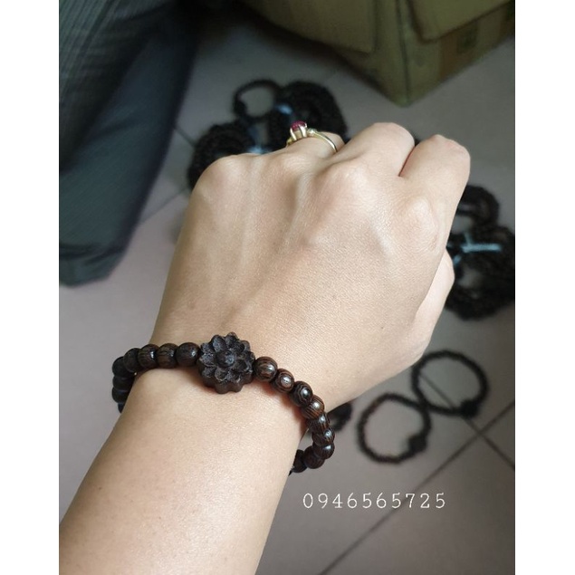 Vòng tay gỗ mun đuôi công mic hoa sen