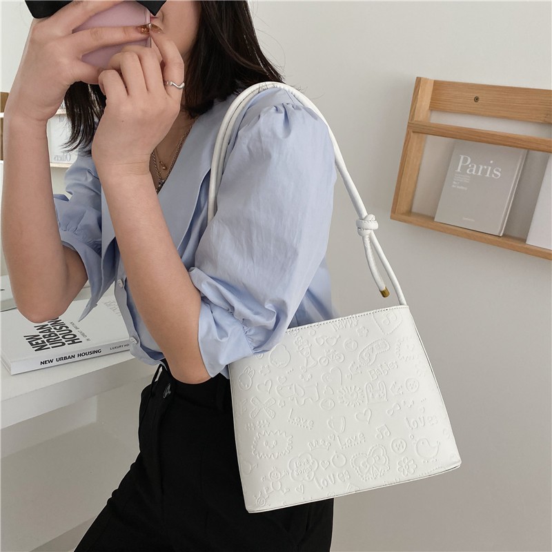 Túi xách đeo vai nữ nhỏ kiểu Pháp da trơn họa tiết dập nổi