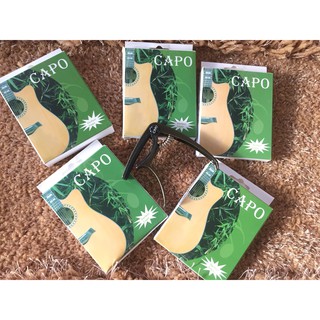 Capo đàn ukulele và guitar