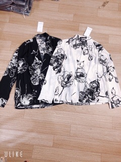 Áo sơ mi cổ V hoa lá cành.