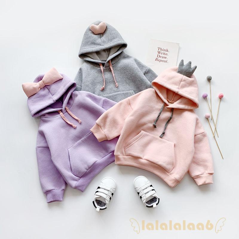 Áo sweater màu trơn dài tay phối túi và dây rút hợp thời trang cho bé trai và bé gái