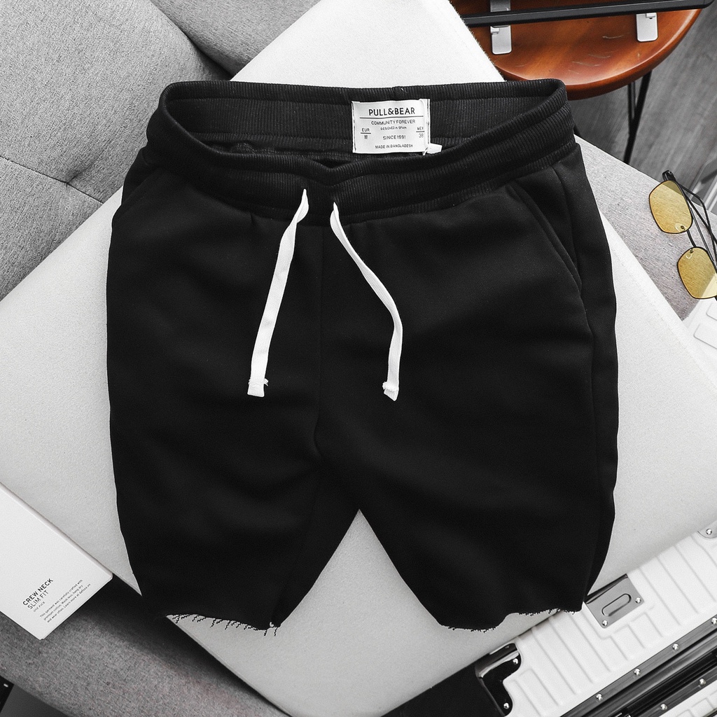 - Quần short nam cắt gấu dài ngang gối