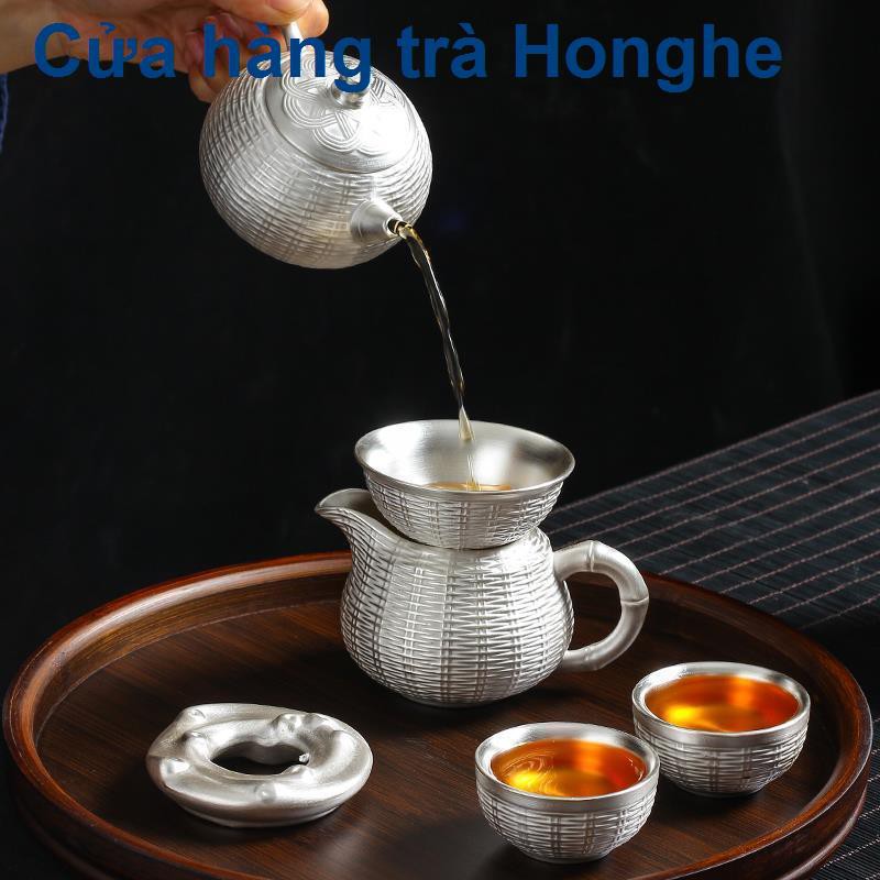 999 sterling bạc ấm trà gốm sứ mạ vàng thủ công gia dụng Xishi Bộ Vân Nam Kungfu <