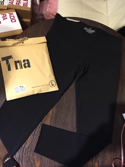 Quần legging Tna