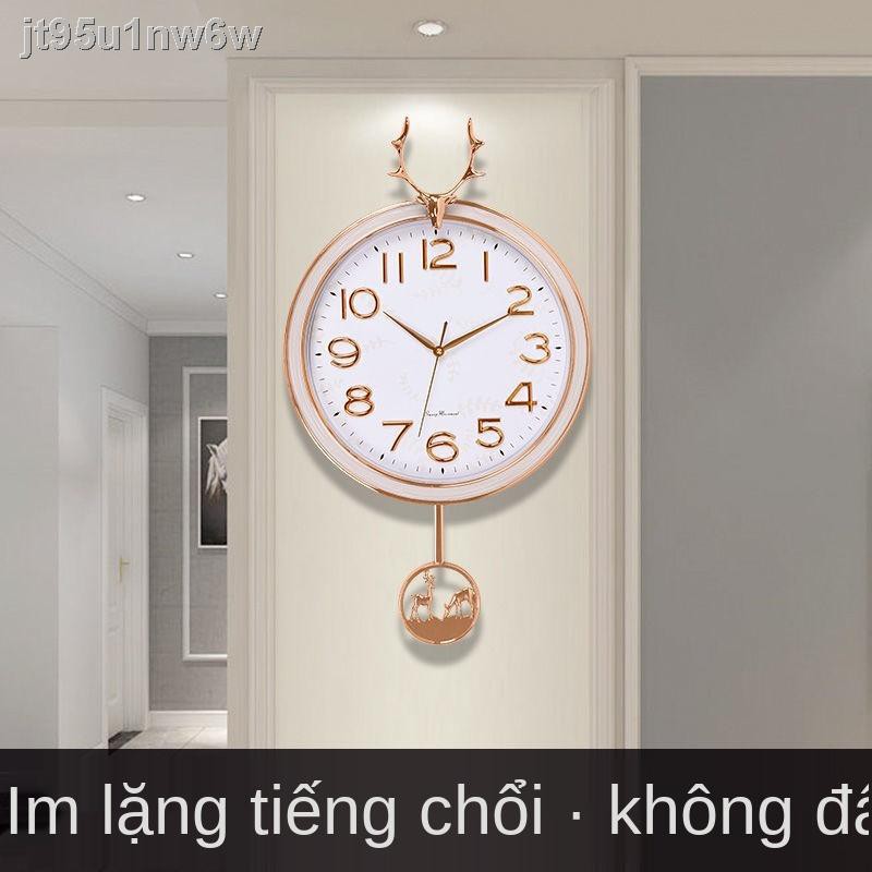 Bắc Âu đầu hươu đồng hồ treo tường phòng khách thời trang nhà ánh sáng sang trọng miễn phí cú đấm tạo hiện đại