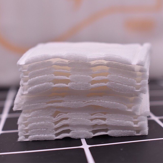 Bông tẩy trang Cotton Pads và bông tẩy trang Natural Cotton Pad 222 miếng 1 túi mẫu mới 2022