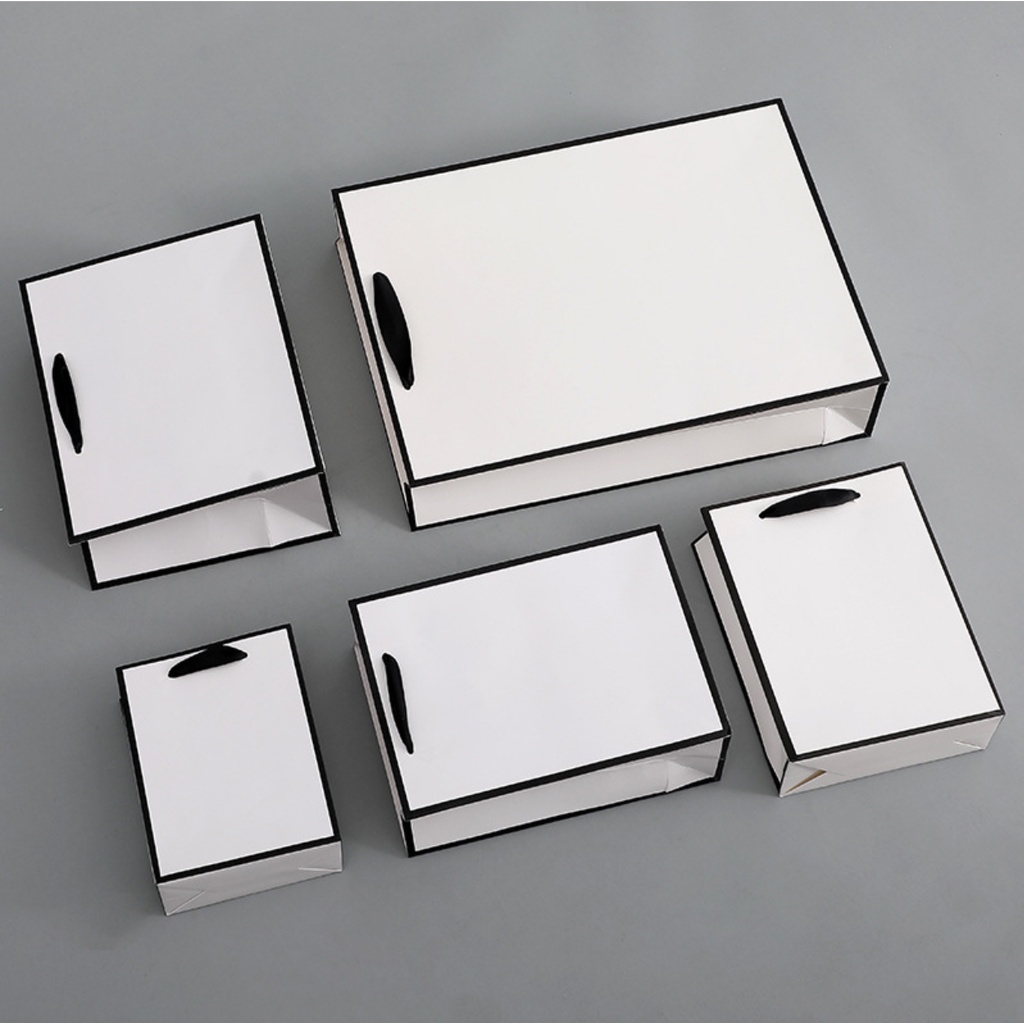 Túi giấy bìa cứng trắng viền đen, quai xách vải đen