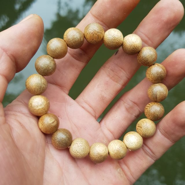 Vòng tay nữ gỗ trầm gió hạt tròn 10 ly