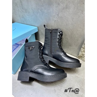 Boot da prada đan dây mai phương bùi