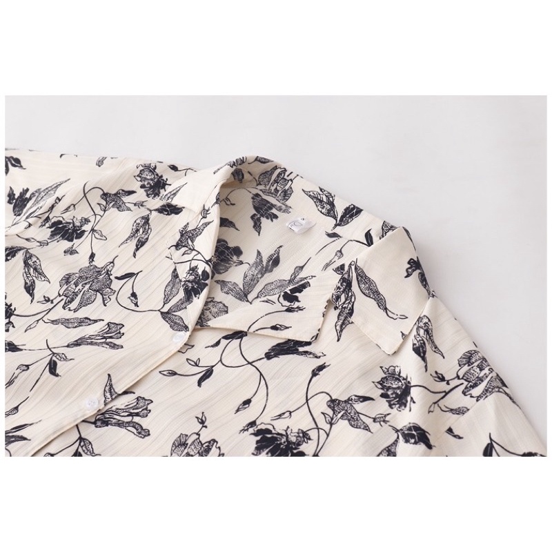 Áo sơ mi nữ cổ vest tay ngắn hoạ tiết hoa lá - MINIBLUE