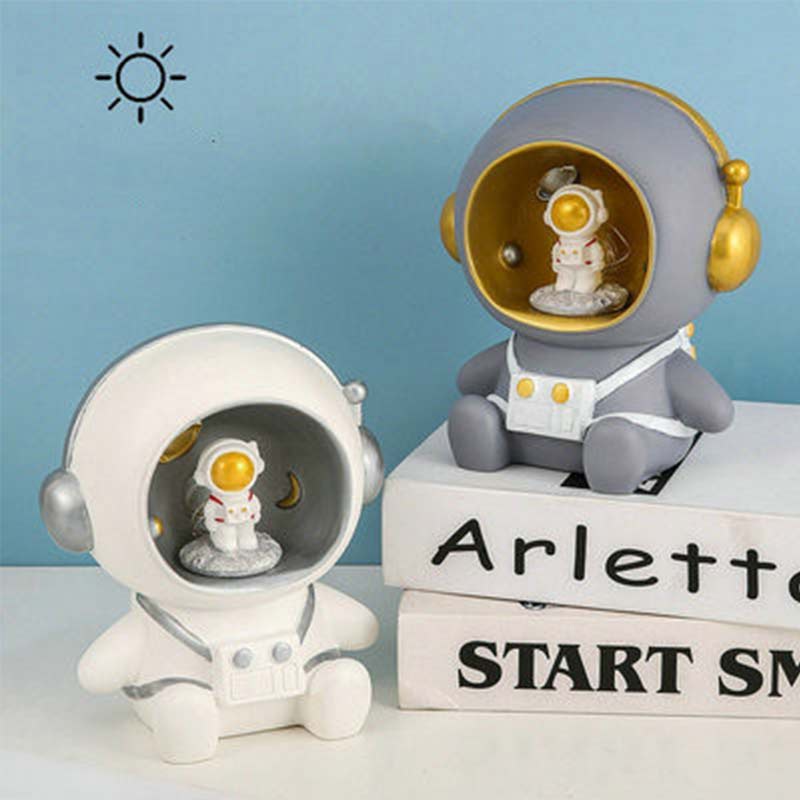 Ống heo tiết kiệm hình phi hành gia có đèn phát sáng