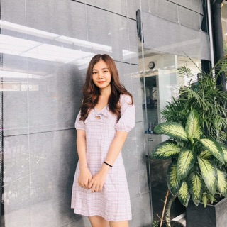 Đầm nơ ngực caro cam