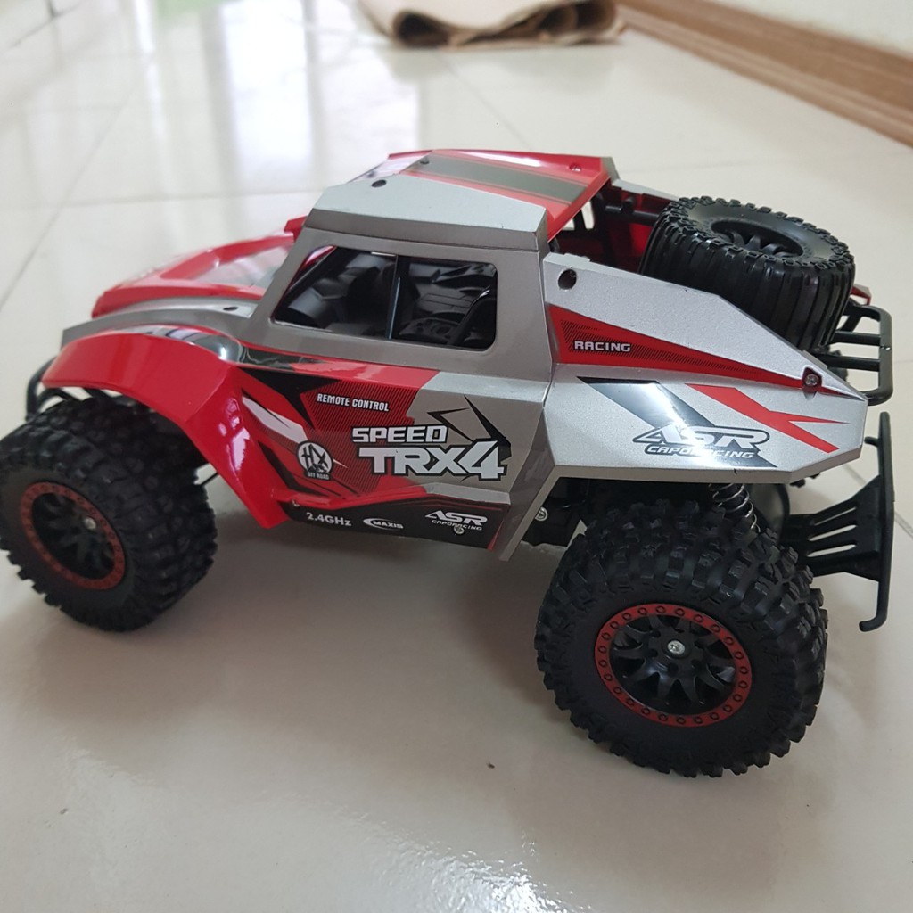 Ô TÔ ĐỊA HÌNH ĐIỀU KHIỂN TỪ XA  HIGH SPEED TRX4 2 MÀU ĐEN ĐỎ, HẦM HỐ, CHẮC CHẮN, SIÊU BỀN, BÉ SẼ THÍCH MÊ