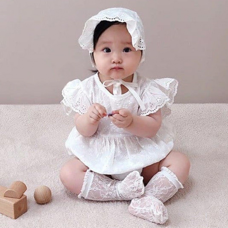 Set áo liền quần ngắn tay và nón có dây cột bằng cotton màu trơn cho bé gái