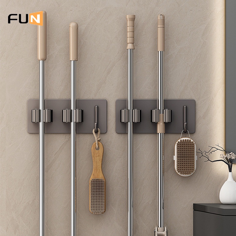 Giá giữ cây lau nhà dạng kẹp không cần khoan lỗ siêu bám dính dành cho nhà vệ sinh
