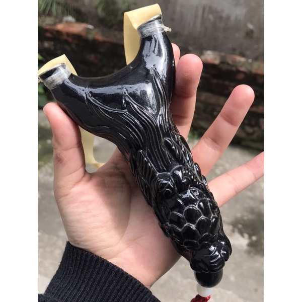 Ná gỗ mun đầu rồng đục tay