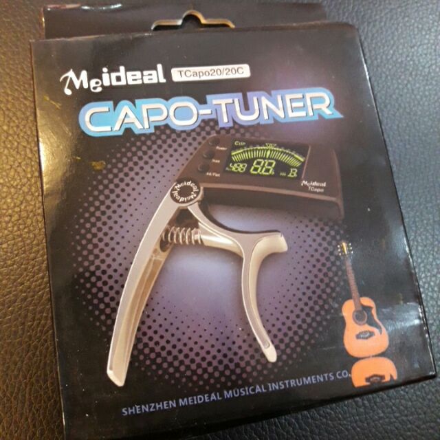 Capo tuner guitar - bền - chất lượng.